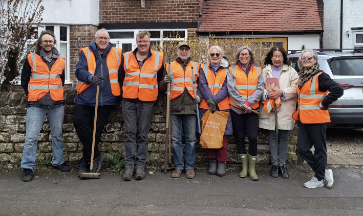 Judith Penney and her team of rain garden weeding volunteers