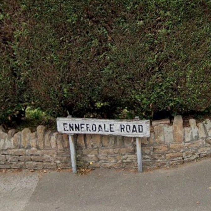 Photos of the Ennerdale Road sign before repainting